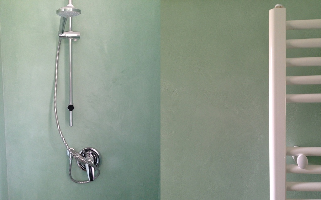 Green Microbond decorative mortar on a shower