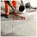 Spreading Crono on a damaged concrete slab